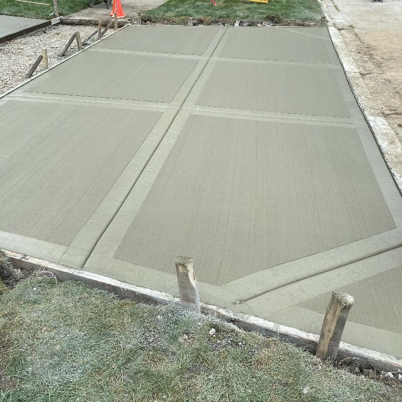 Broom-finish concrete with smooth picture-frame bands