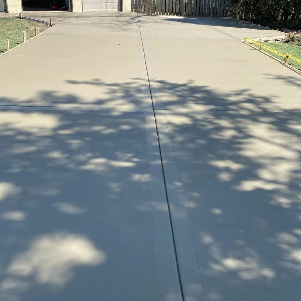 Long concrete driveway with a center joint